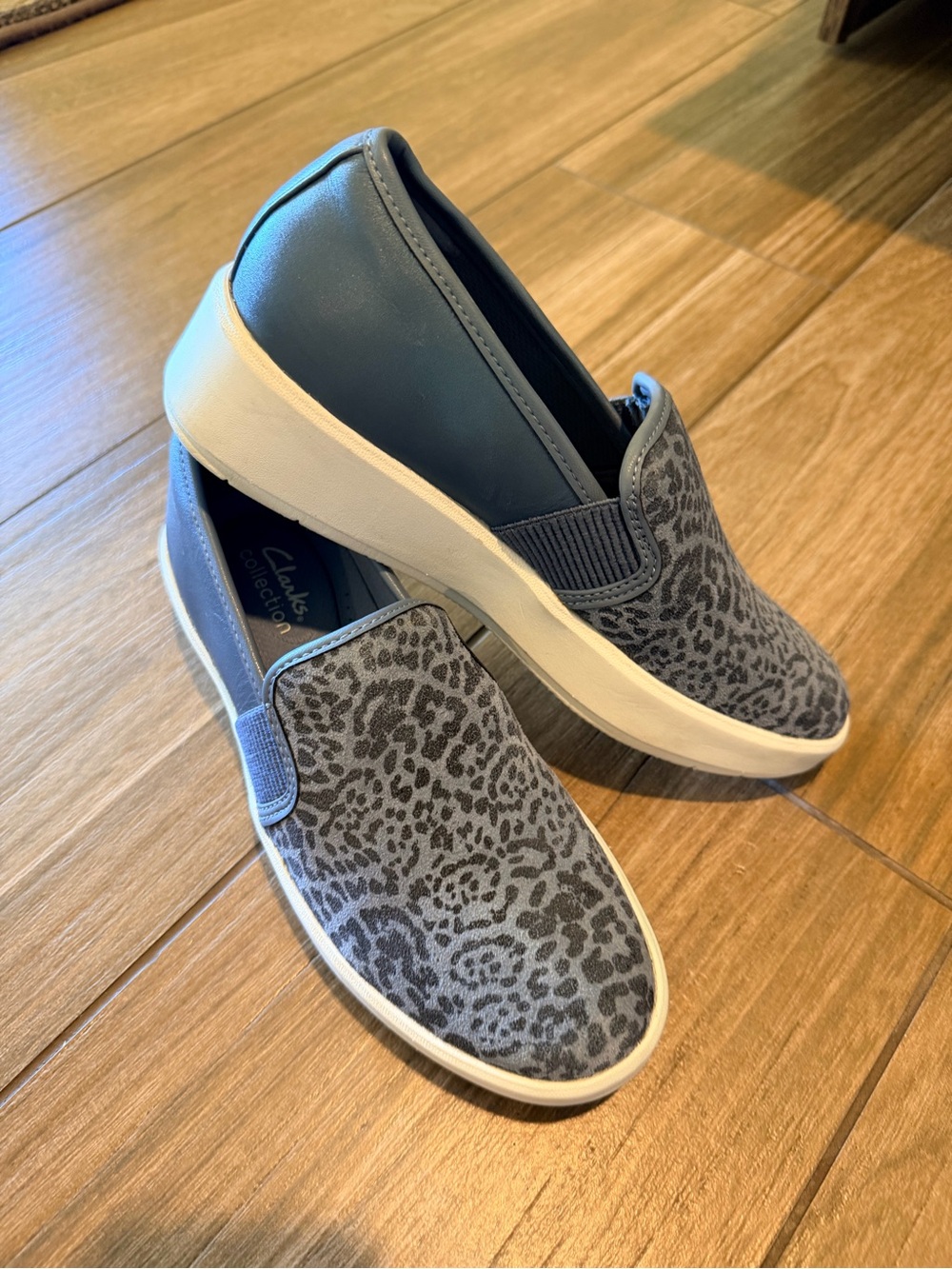 Clarks Women’s Slip-On Sneakers in Blue Leopard Print